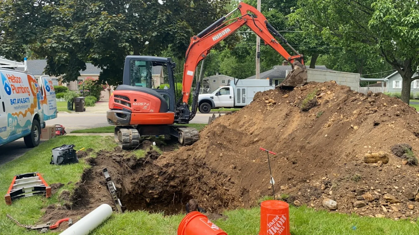Deep sewer line replacement trench with mini excavator